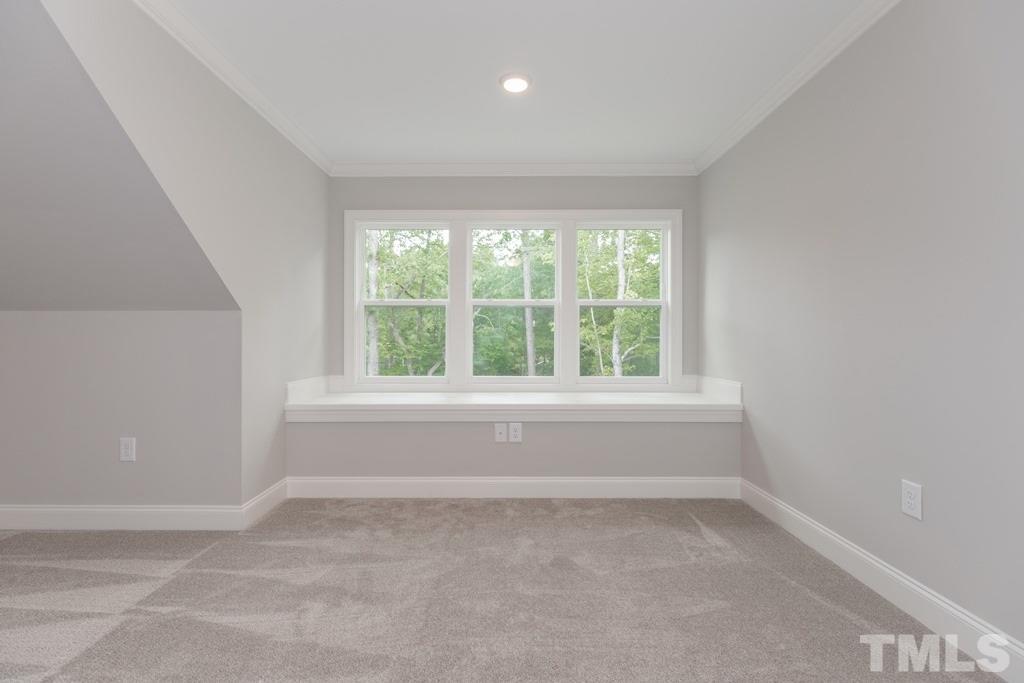 8000 Ghost Pony Trail Raleigh, NC 27613 - Photo 20 of 30 a view of room with window