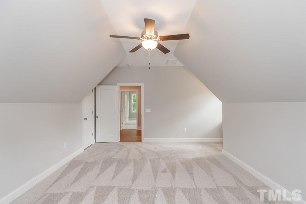 8000 Ghost Pony Trail Raleigh, NC 27613 - Photo 24 of 30 a view of empty room with ceiling fan