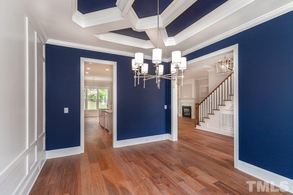 8000 Ghost Pony Trail Raleigh, NC 27613 - Photo 10 of 30 a view of a hallway with wooden floor and entryway