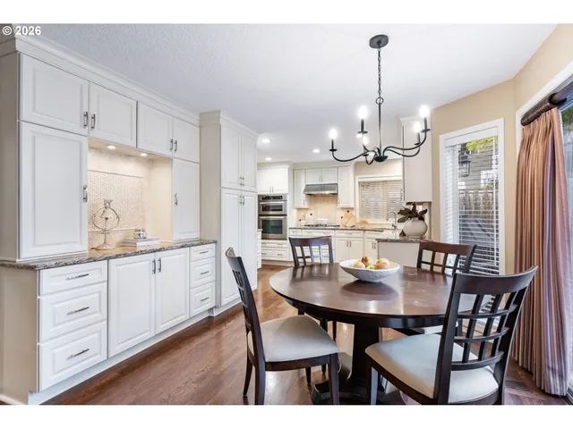 a view of a dining room and chandelier