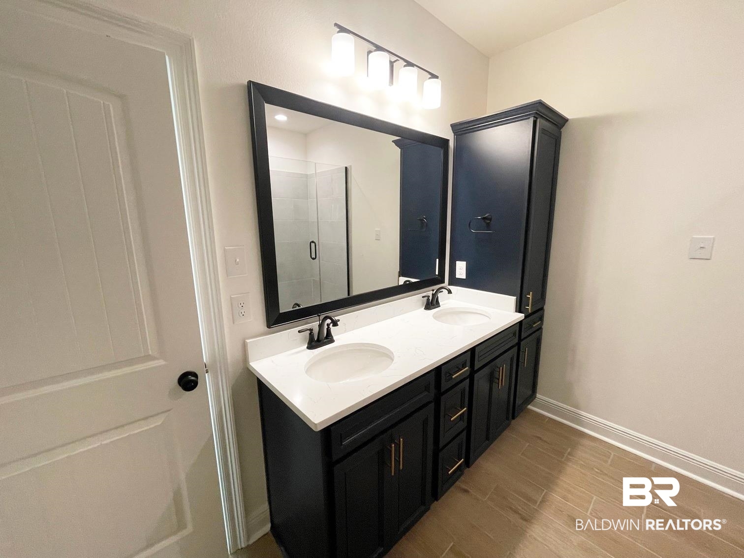 1363 Fenton Circle Foley, AL 36535 - Photo 8 of 20 Bathroom with hardwood / wood-style floors, vanity, and walk in shower