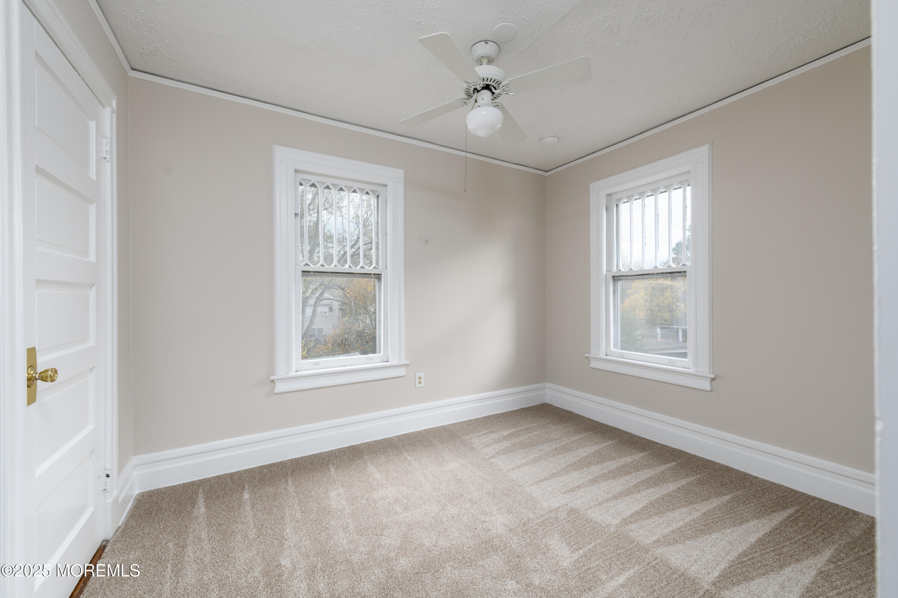 64 Harding Road Red Bank, NJ 07701 - Photo 18 of 23 a view of an empty room with a window