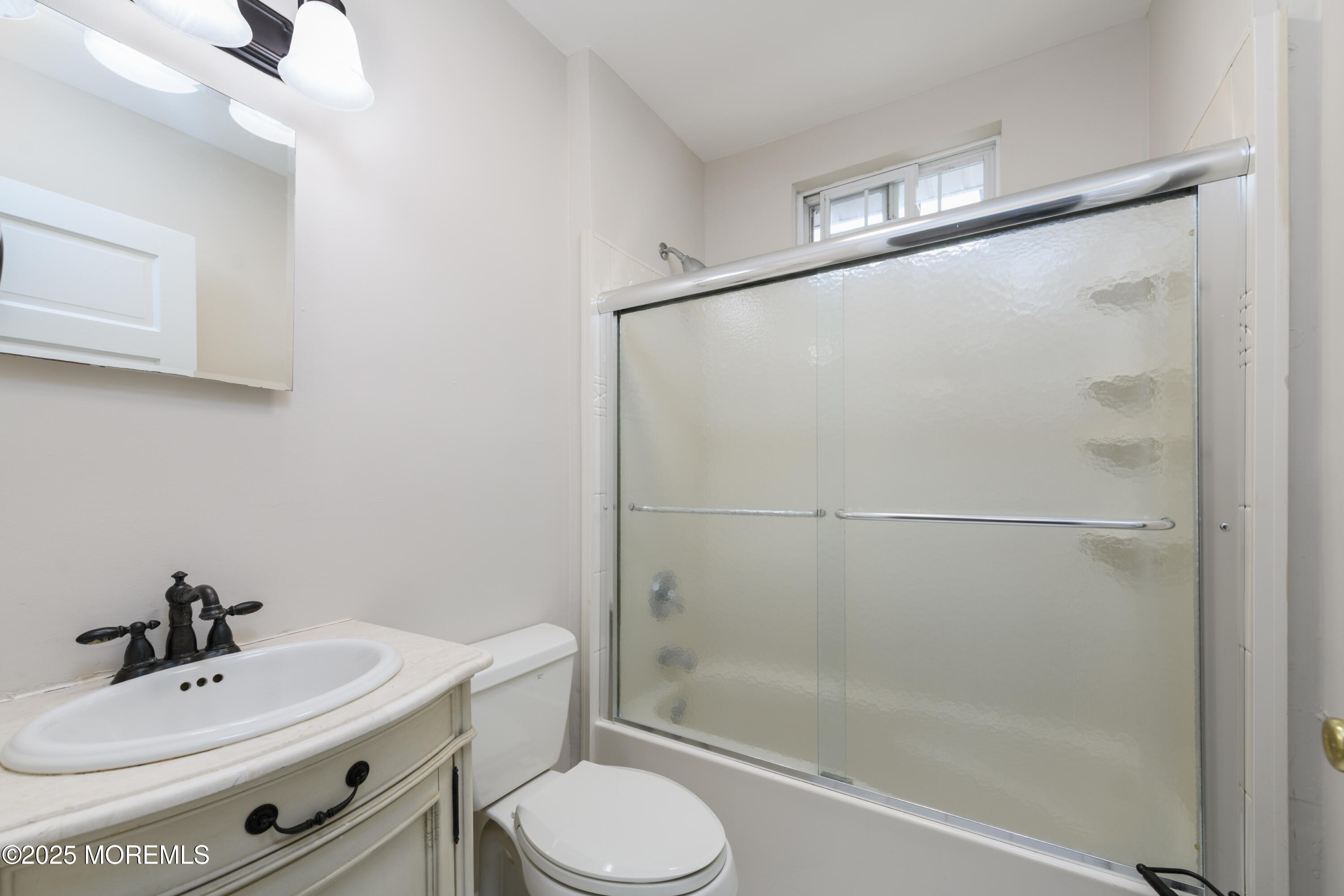 64 Harding Road Red Bank, NJ 07701 - Photo 19 of 23 a bathroom with a sink toilet and shower