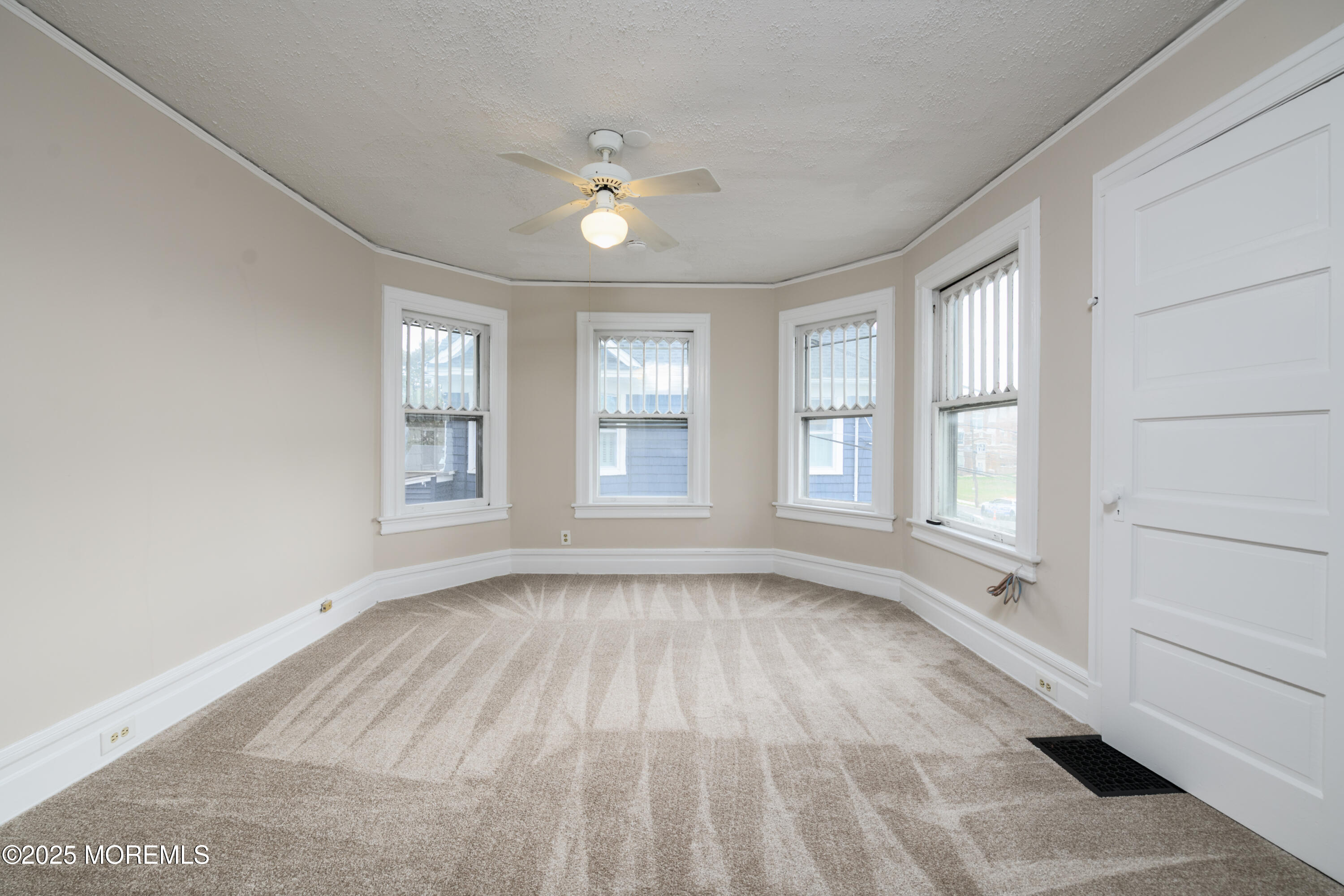 64 Harding Road Red Bank, NJ 07701 - Photo 20 of 23 a view of an empty room with a window