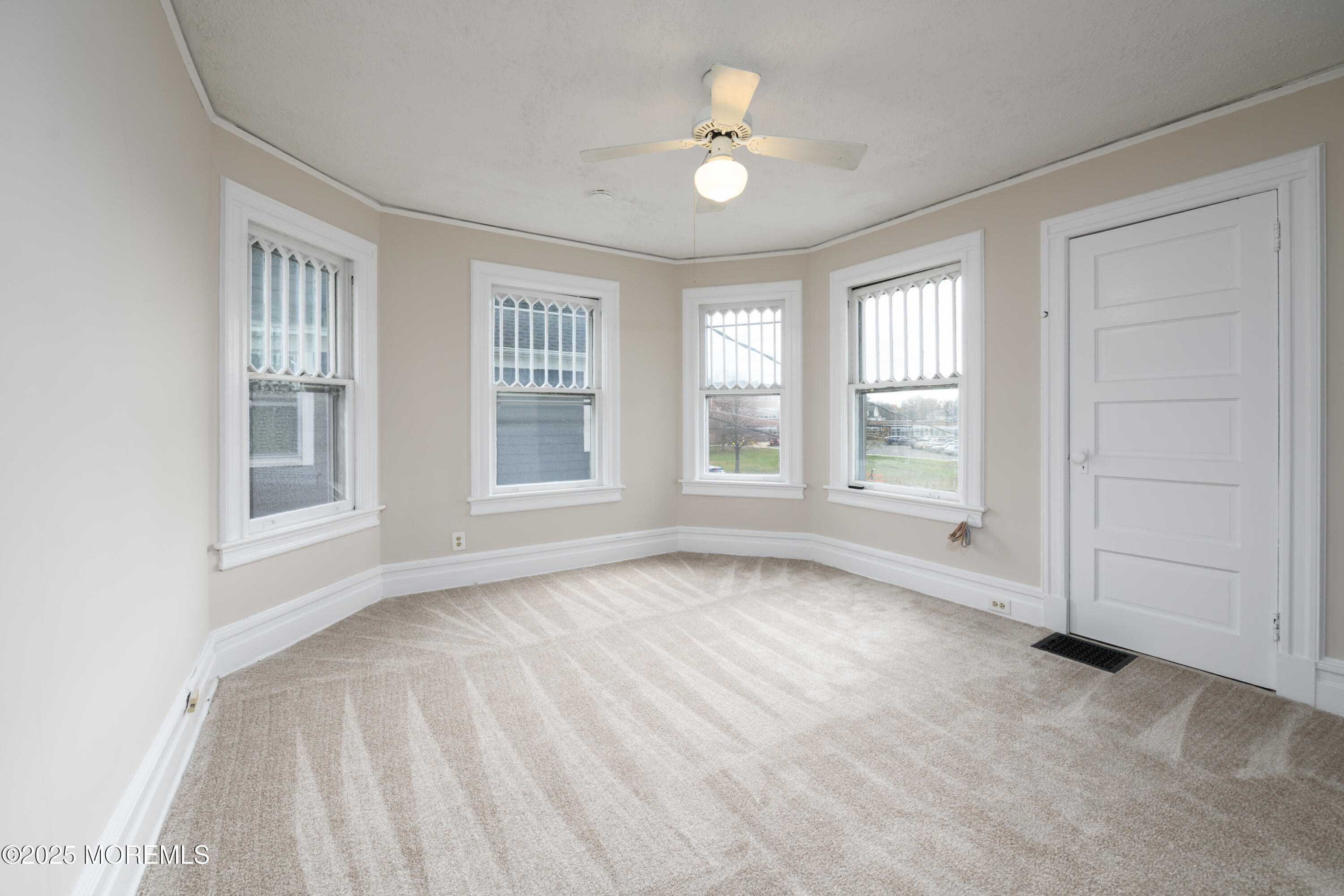 64 Harding Road Red Bank, NJ 07701 - Photo 21 of 23 a view of an empty room with a window