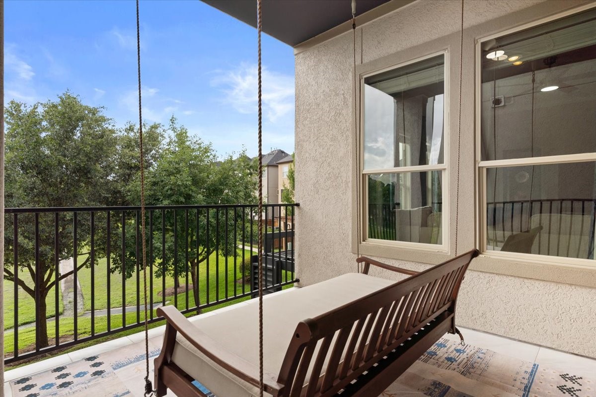 10215 Spring Shadows Park Circle Houston, TX 77080 - Photo 15 of 44 2nd floor balcony overlooking the walking trails and green space. Great place to relax and entertain.