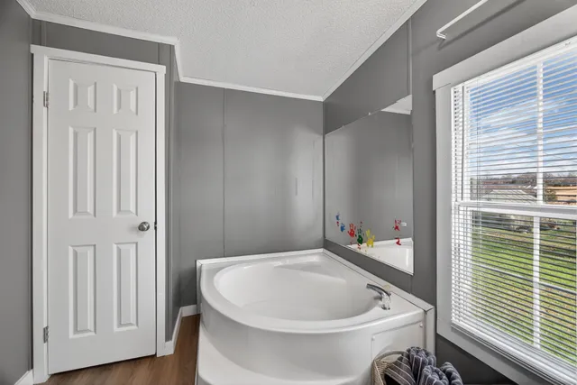 a bathroom with a toilet and a sink