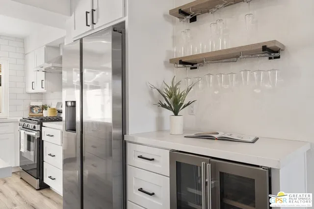 a bedroom with a bed and a table