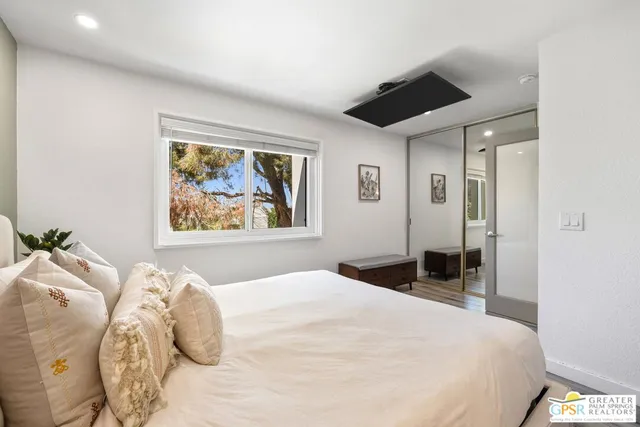 a workspace with furniture and window