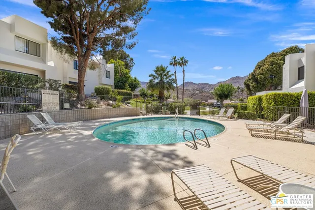 a view of a balcony with a ocean view