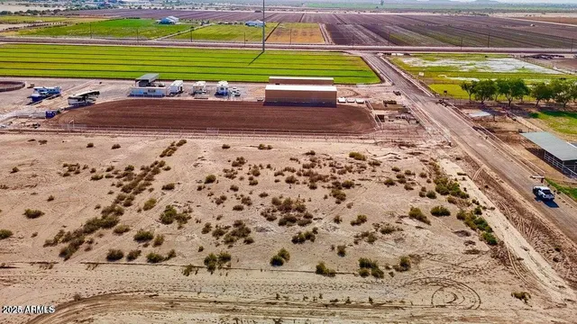 a view of a park with chairs