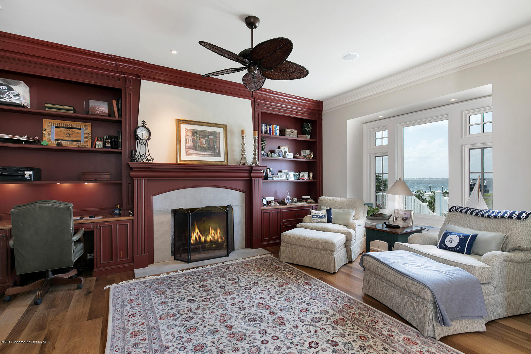 459 Normandy Drive Normandy Beach, NJ 08738 - Photo 17 of 38 a living room with furniture and a fireplace