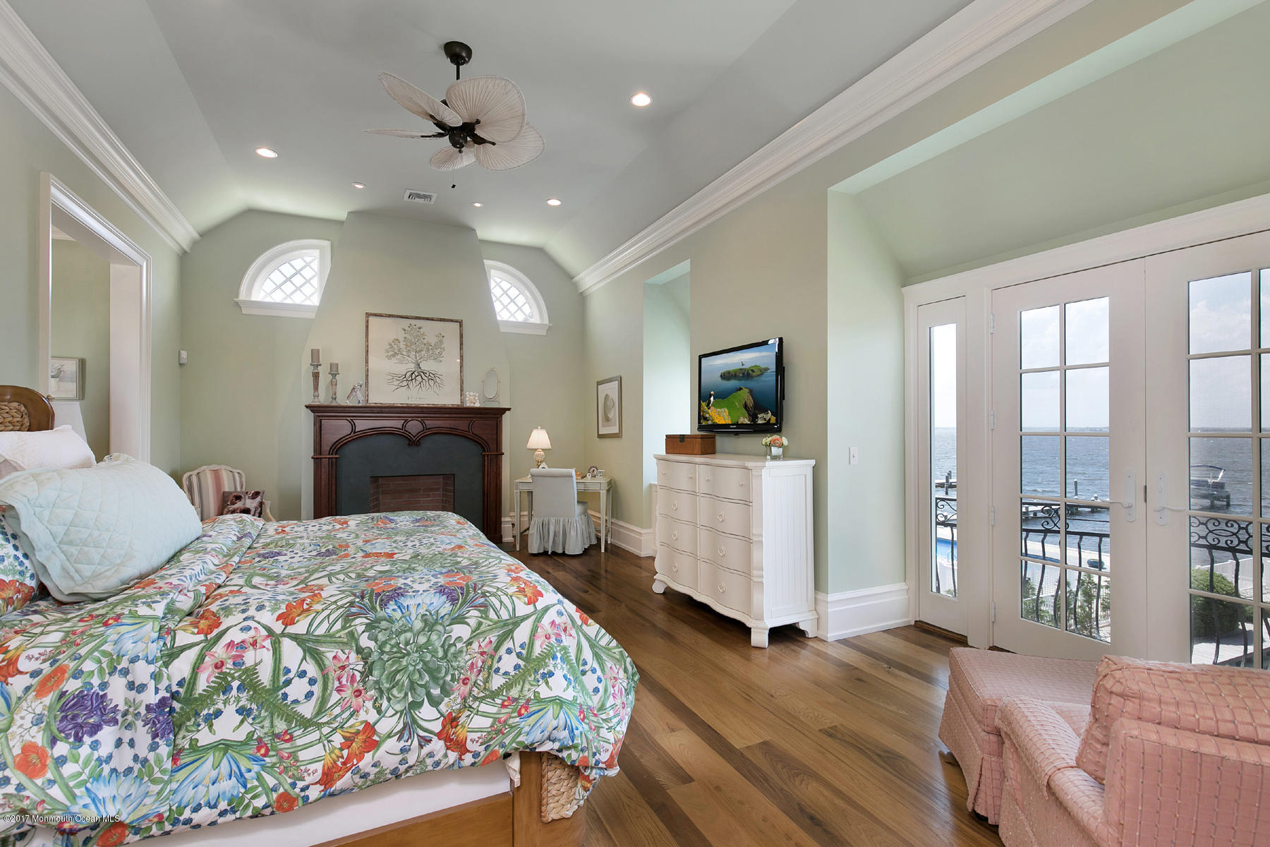 459 Normandy Drive Normandy Beach, NJ 08738 - Photo 18 of 38 a bedroom with a bed and glass walk in closet