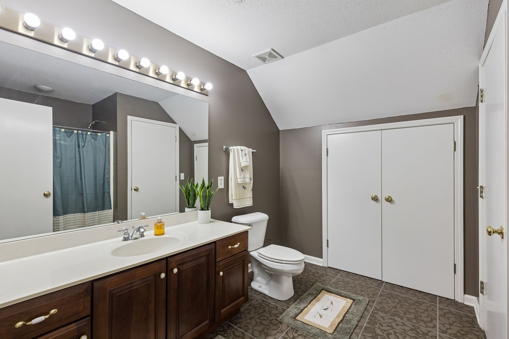 7488 Lowe Lane Rockvale, TN 37153 - Photo 41 of 81 a spacious bathroom with a double vanity sink toilet and a mirror