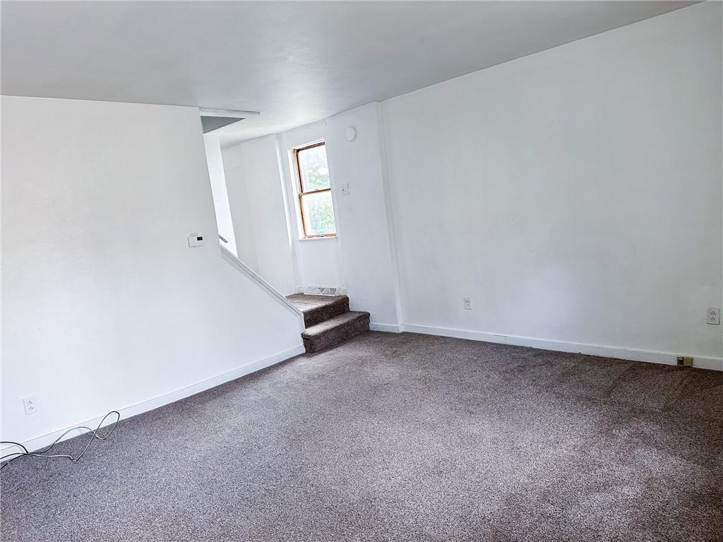 116-118 Rudolph Place Apollo, PA 15613 - Photo 4 of 12 an empty room with windows