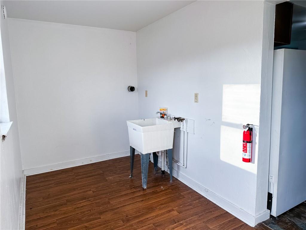 116-118 Rudolph Place Apollo, PA 15613 - Photo 8 of 12 a bathroom with a sink and a mirror