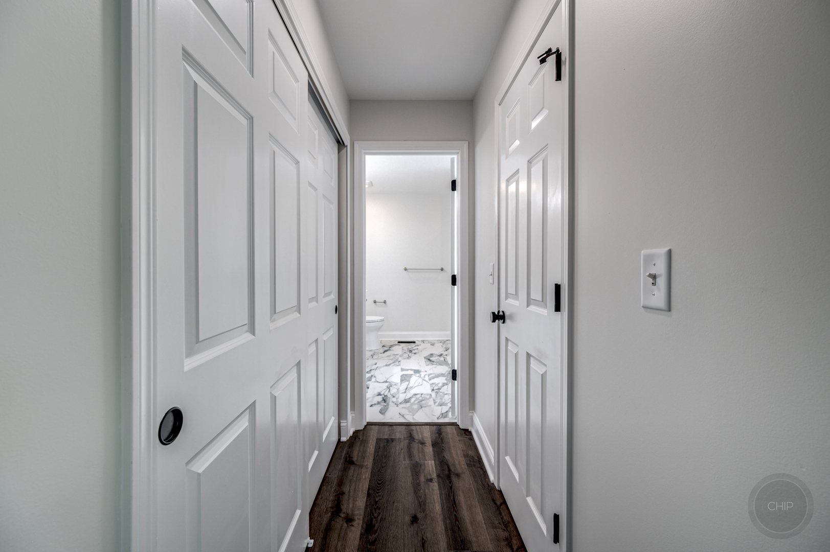 12948 Parterre Place Plainfield, IL 60585 - Photo 26 of 35 a view of a hallway with wooden floor and staircase