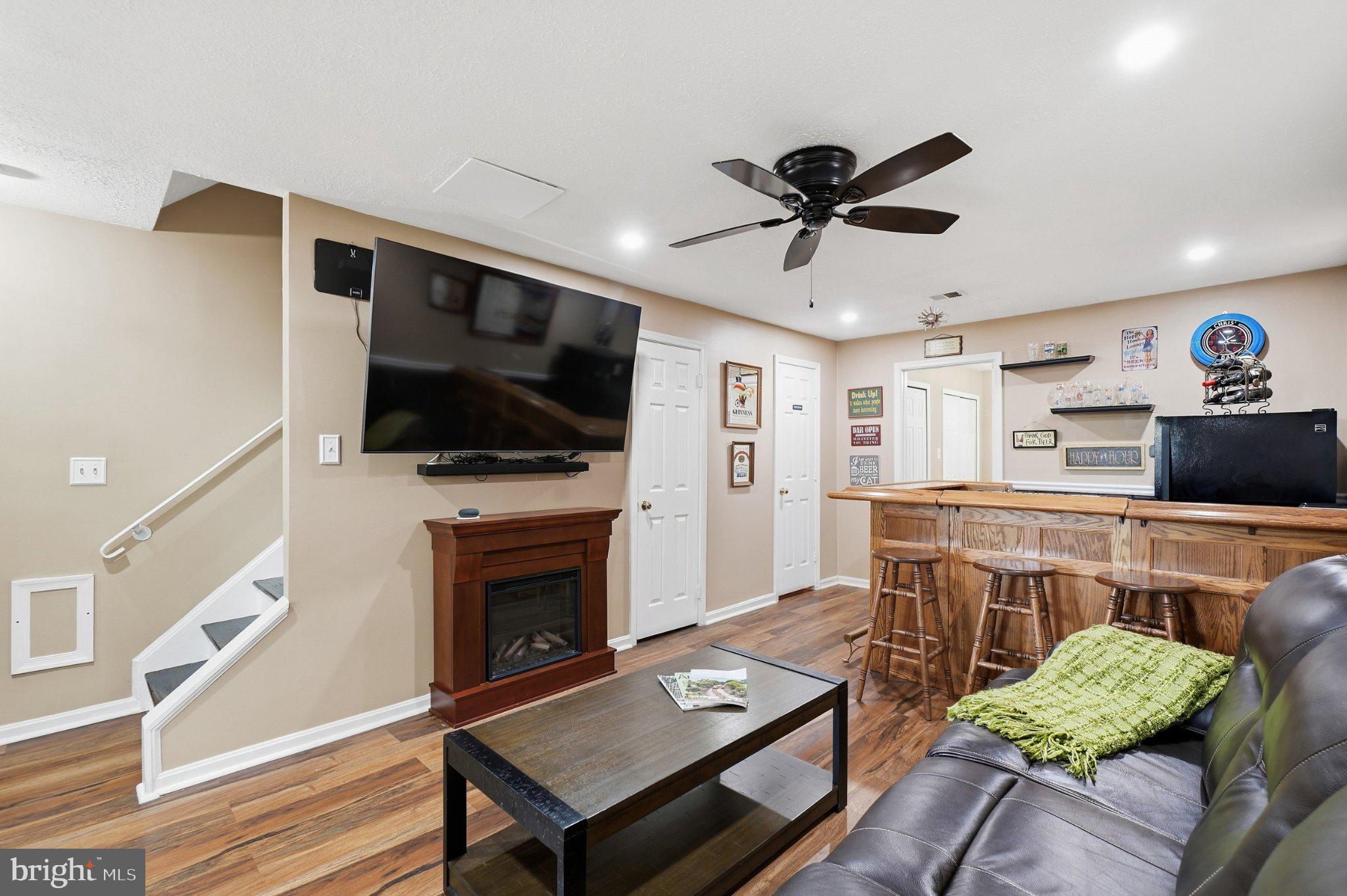 3934 9th Road South Arlington, VA 22204 - Photo 13 of 24 Lower level renovated rec room - LVP flooring