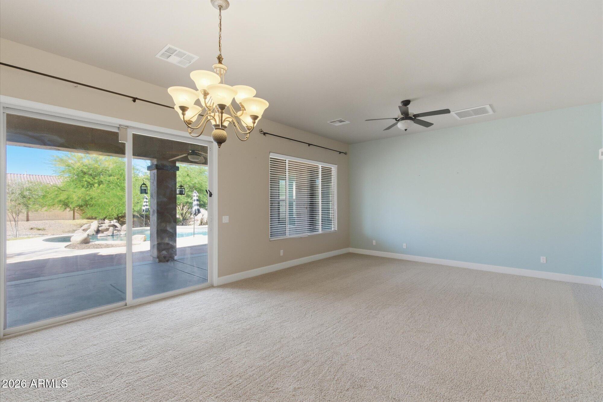 6914 West Fremont Road Laveen, AZ 85339 - Photo 11 of 32 a view of an empty room with a window