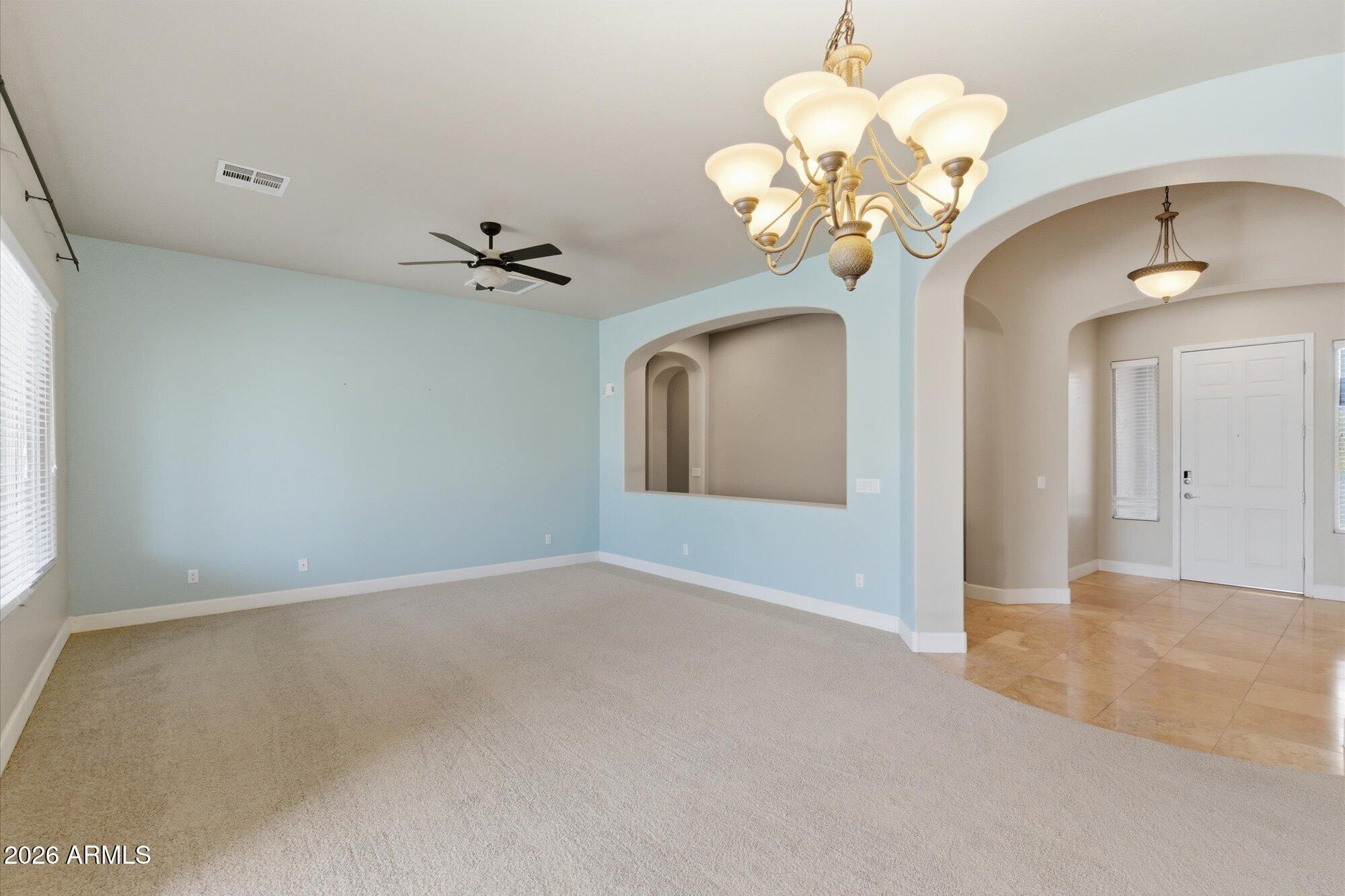 6914 West Fremont Road Laveen, AZ 85339 - Photo 12 of 32 a view of a chandelier in a room
