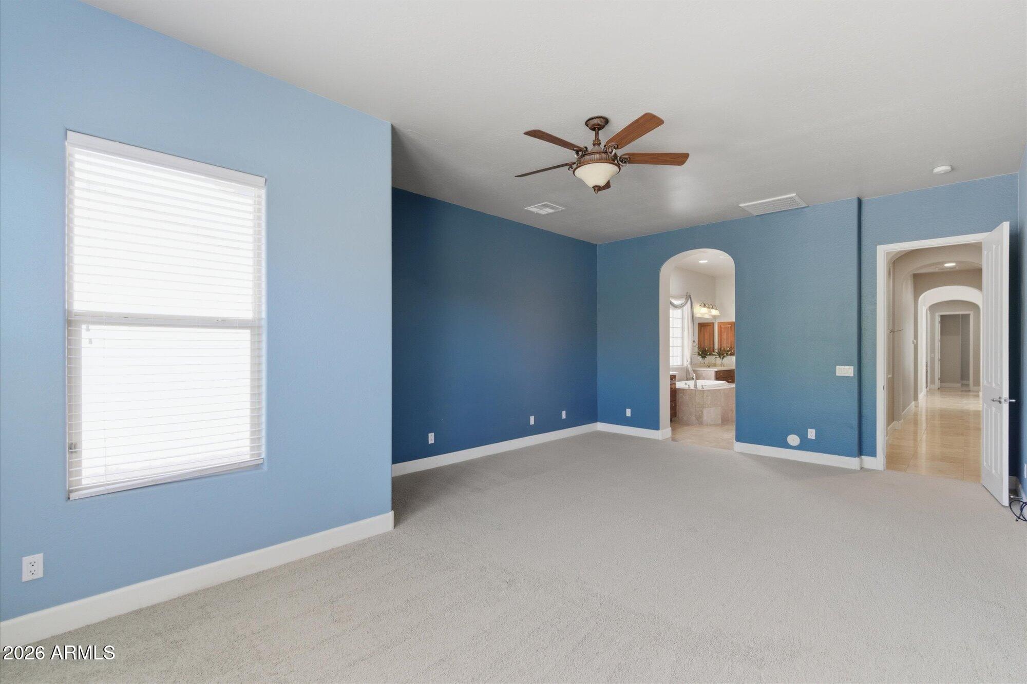 6914 West Fremont Road Laveen, AZ 85339 - Photo 14 of 32 a view of an empty room with a window