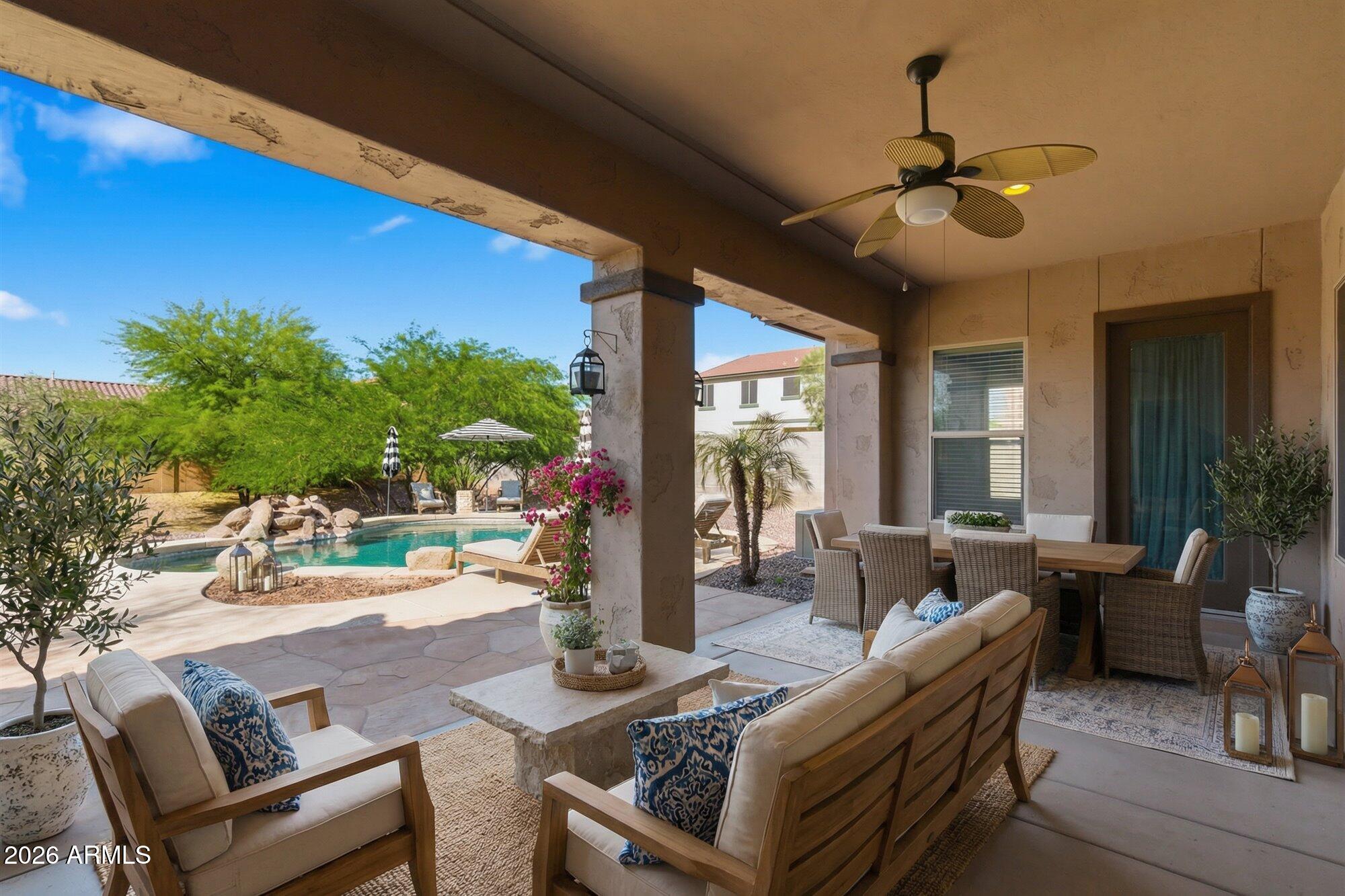 6914 West Fremont Road Laveen, AZ 85339 - Photo 28 of 32 a living room with furniture and a large window