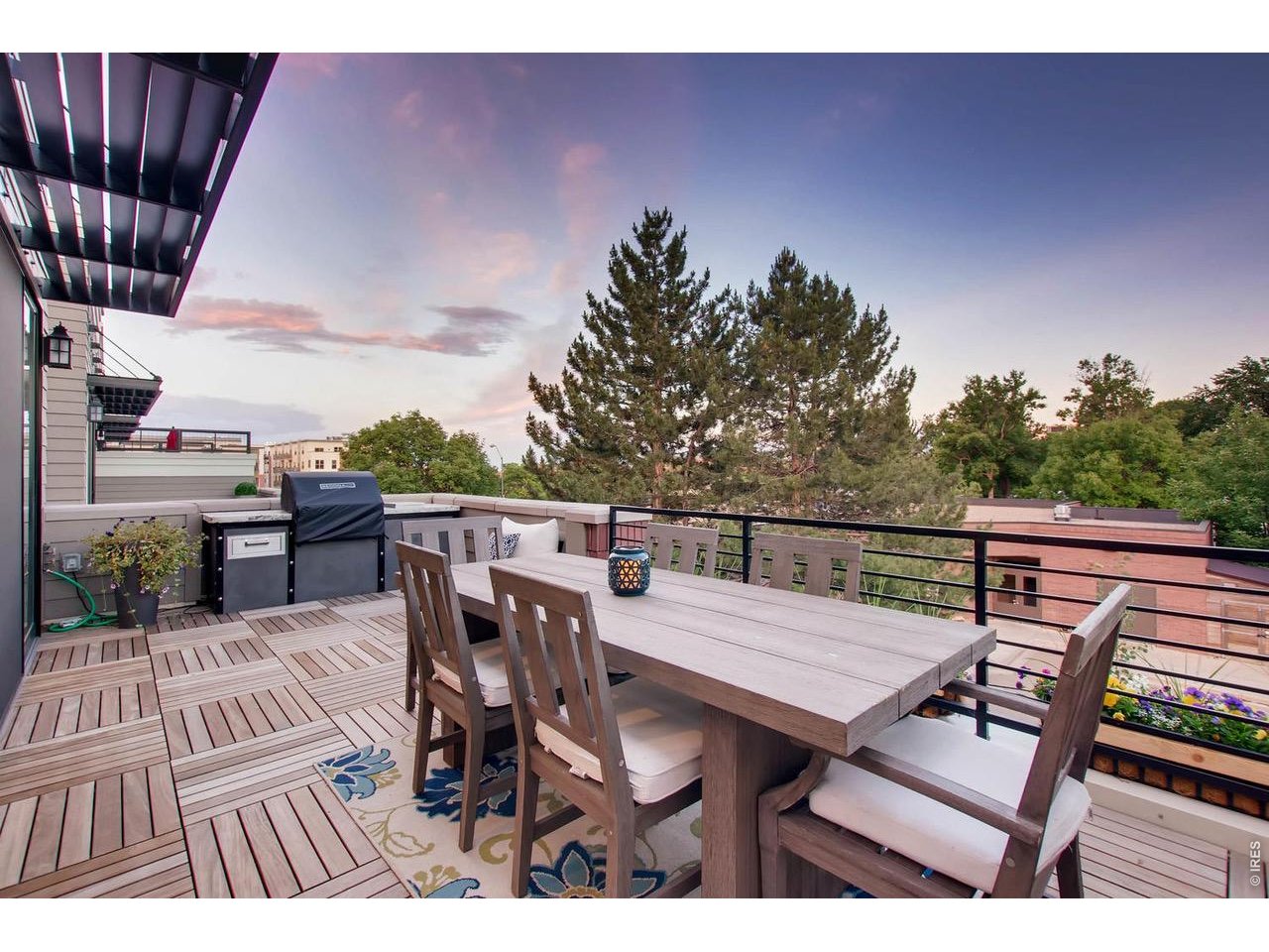 315 North Howes Street Fort Collins, CO 80521 - Photo 23 of 43 a terrace with outdoor seating and wooden floor