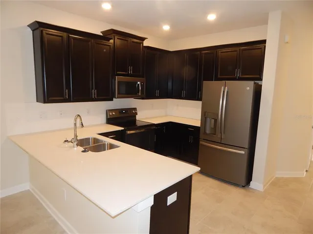 a refrigerator in a kitchen