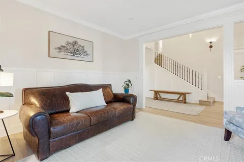 a living room with furniture and windows