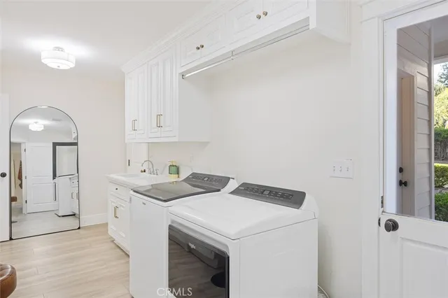 a view of a living room and a balcony