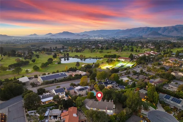 a view of a city with mountains in the background