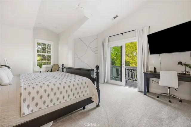 a bath room with a potted plant