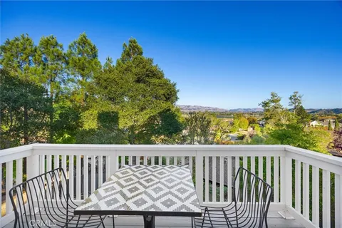 a spacious bathroom with a double vanity sink and a mirror