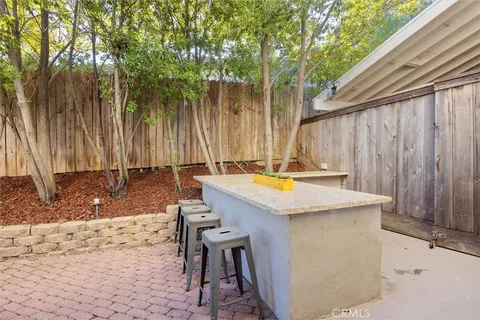 a view of balcony with furniture