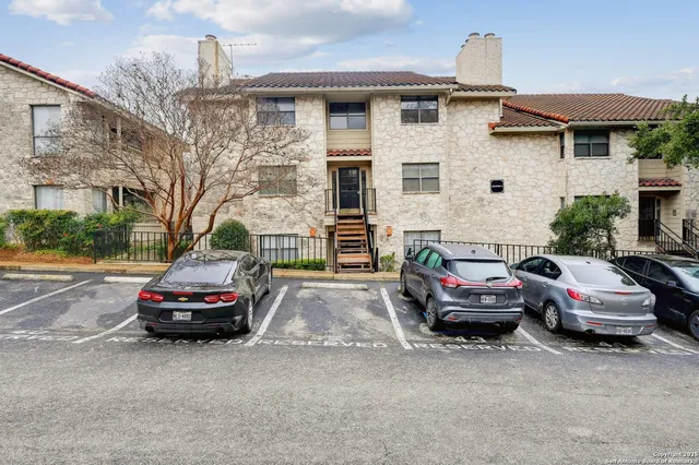 a car parked in front of a house
