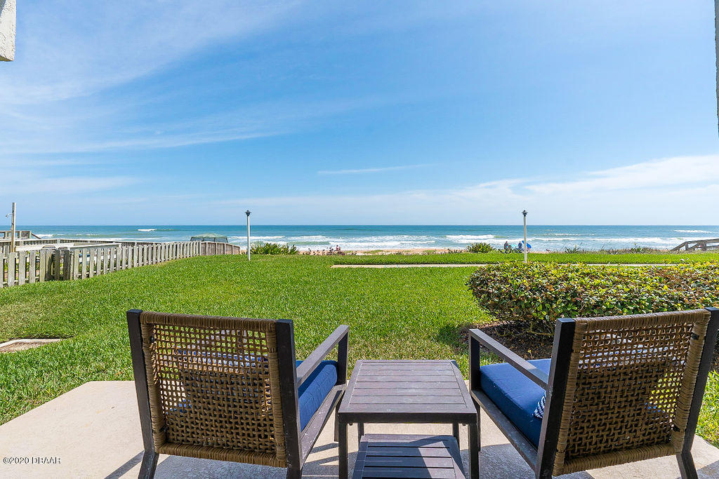 1275 Ocean Shore Boulevard, Unit 108 Ormond Beach, FL 32176 - Photo 4 of 26 a terrace with outdoor seating