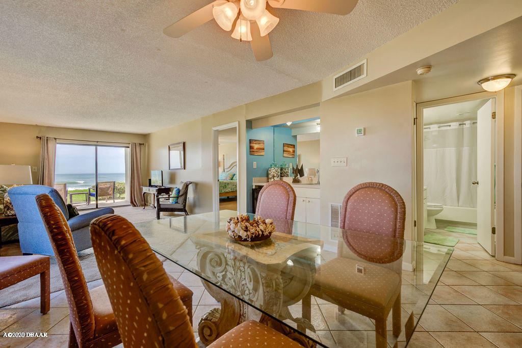 1275 Ocean Shore Boulevard, Unit 108 Ormond Beach, FL 32176 - Photo 8 of 26 a view of a livingroom with furniture