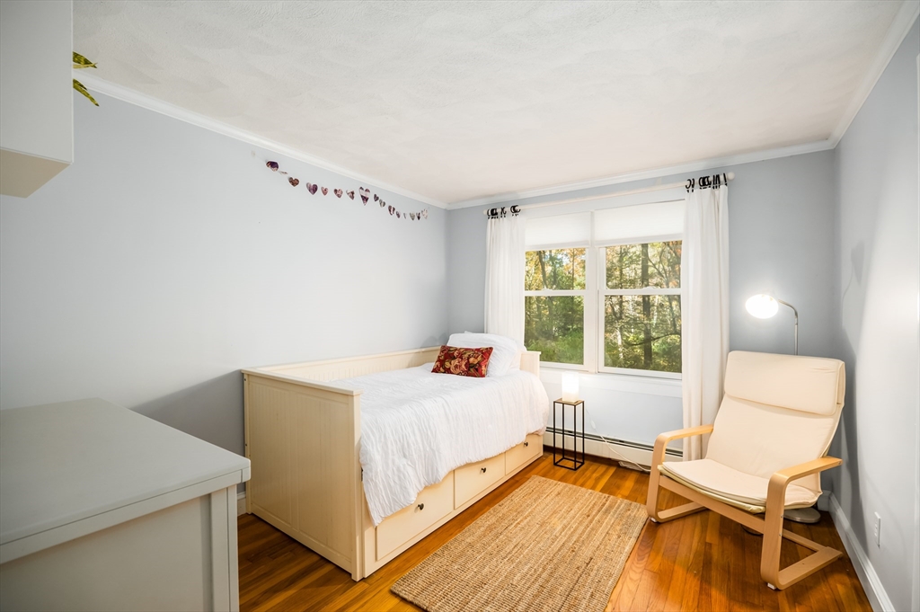 92 Pleasant Street Wenham, MA 01984 - Photo 15 of 33 a room with a bed and a window