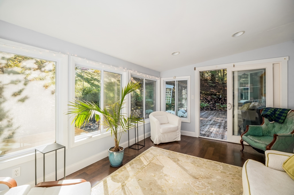 92 Pleasant Street Wenham, MA 01984 - Photo 19 of 33 a living room with furniture and a large window
