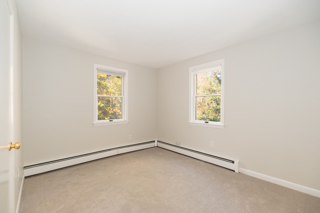 92 Pleasant Street Wenham, MA 01984 - Photo 26 of 33 an empty room with a window
