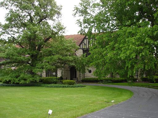 827 Taft Road Hinsdale, IL 60521 - Photo 1 of 1 a front view of a house with a garden