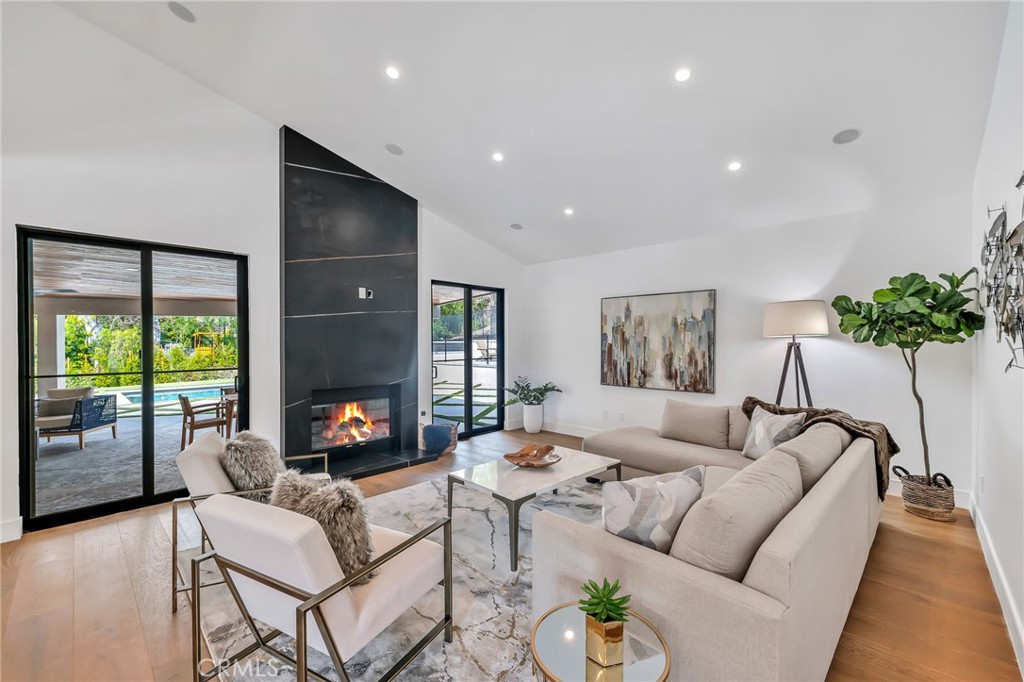 792 Gloucester Lane Thousand Oaks, CA 91362 - Photo 14 of 72 a living room with furniture and a fireplace