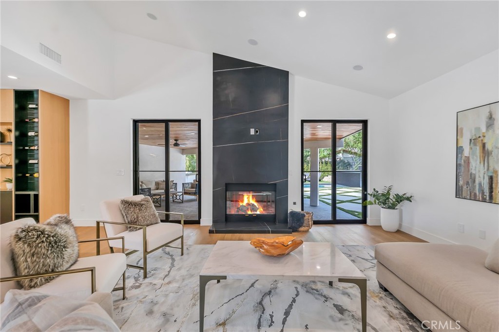 792 Gloucester Lane Thousand Oaks, CA 91362 - Photo 17 of 72 a living room with furniture and a flat screen tv