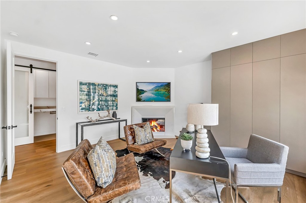 792 Gloucester Lane Thousand Oaks, CA 91362 - Photo 28 of 72 a living room with furniture and a wooden floor