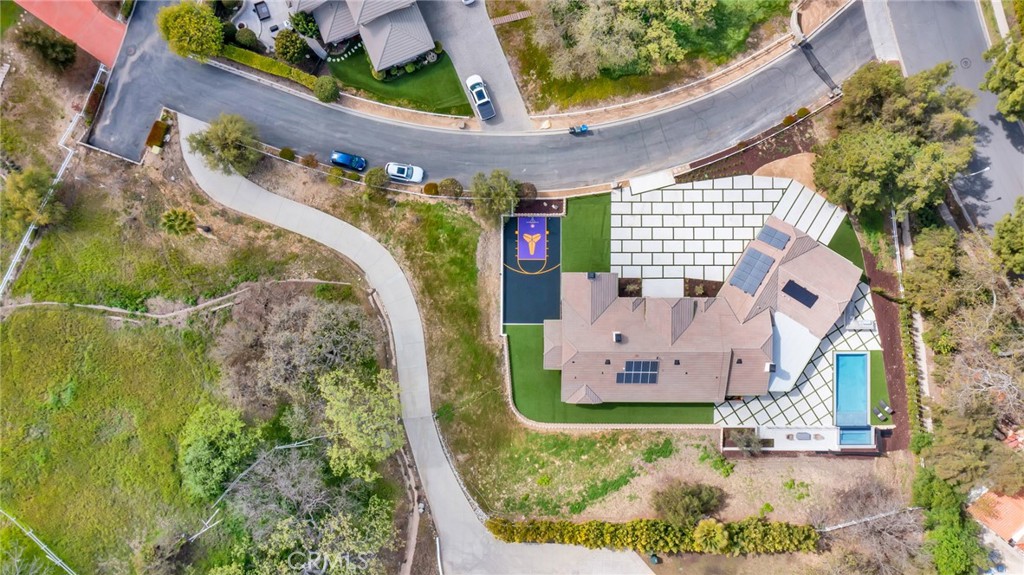 792 Gloucester Lane Thousand Oaks, CA 91362 - Photo 51 of 72 an aerial view of a house with a garden and swimming pool
