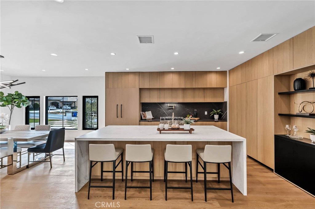 792 Gloucester Lane Thousand Oaks, CA 91362 - Photo 10 of 72 a kitchen with a table and chairs in it