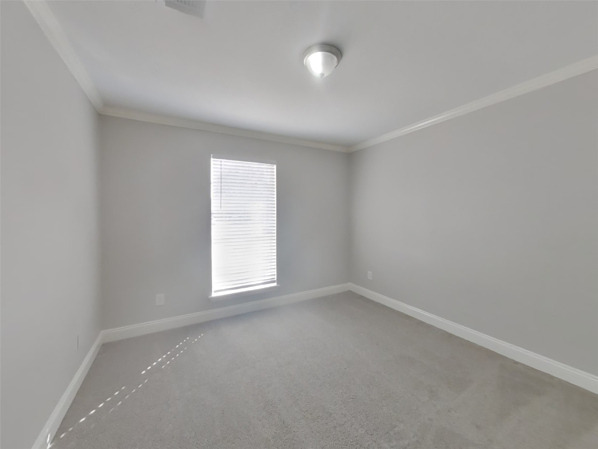 14218 Overbrook Lane Houston, TX 77077 - Photo 14 of 18 an empty room with a window