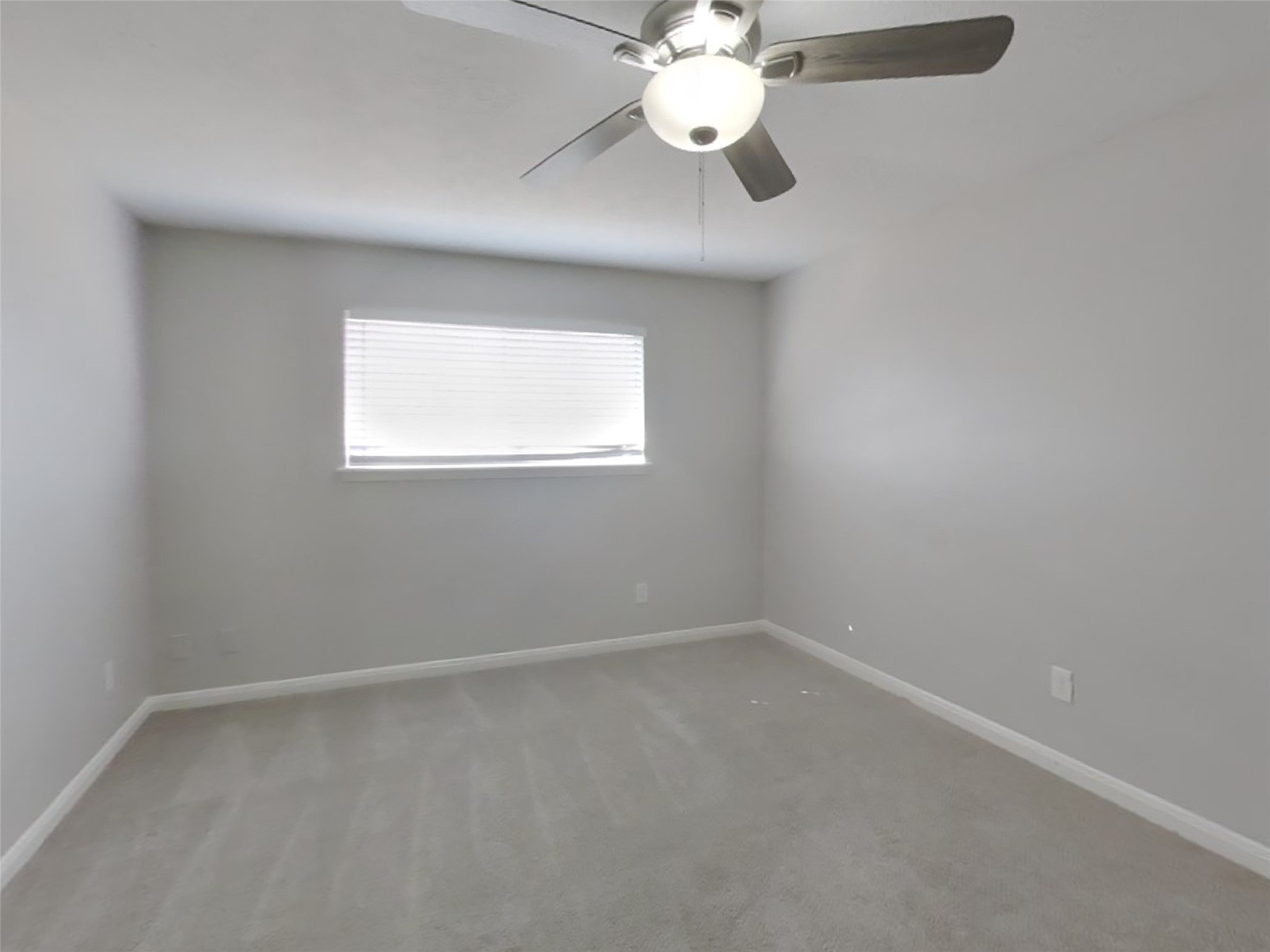 14218 Overbrook Lane Houston, TX 77077 - Photo 8 of 18 an empty room with a window