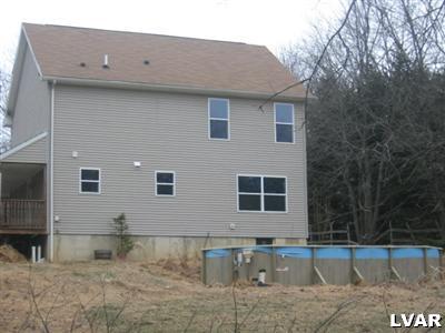 466 English Road Bath, PA 18014 - Photo 5 of 8 a front view of a house with a yard