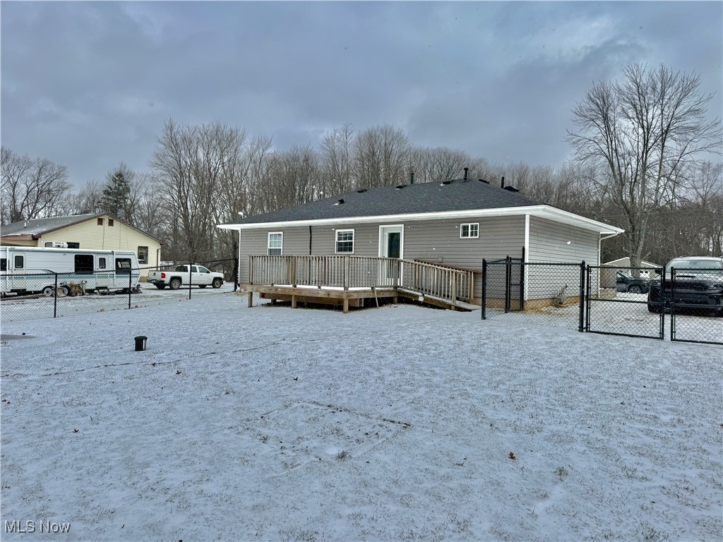 3024 Dutt Road Barberton, OH 44203 - Photo 6 of 33 VIEW FROM THE BACKYARD. FRONT/BACK PORCHES INSTALLED IN 2019. CHAIN LINK FENCE FOR YOUR PETS, AND MORE ROOM OUTSIDE THE FENCE LINE TO EXPAND!